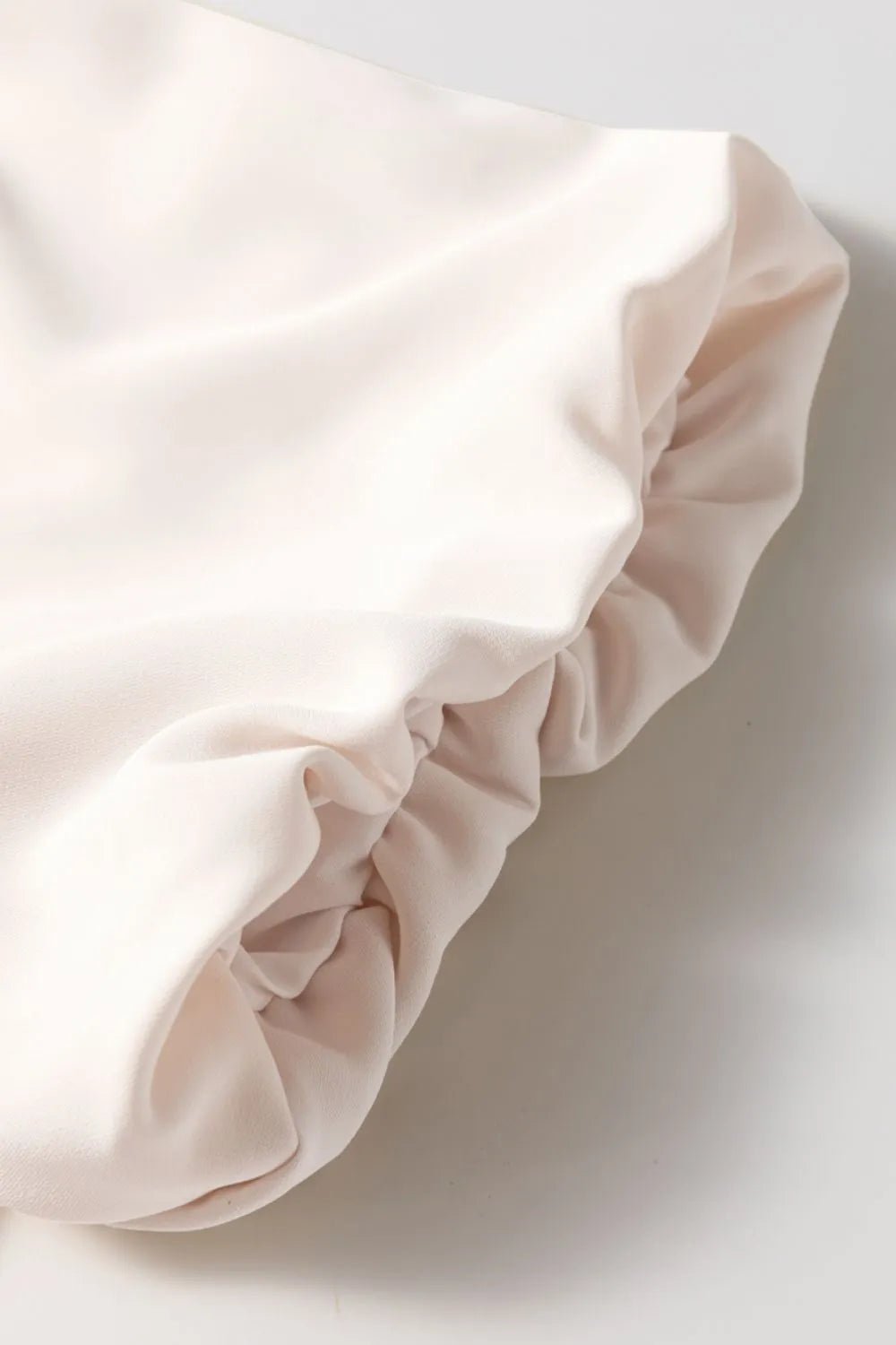 Bow Tie Short Puff Sleeve Ruffle Hem Blouse – Eggshell for Shopify Collective (7 view)