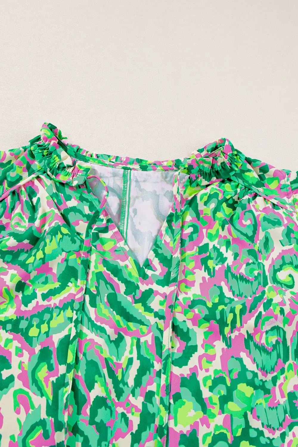 Abstract Print Ruffled Trim Tie Neck Top – Green by Simply Love