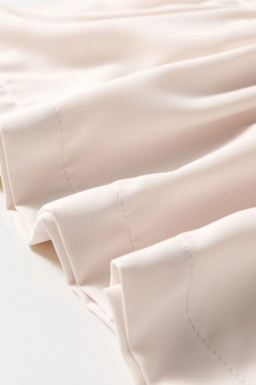 Bow Tie Short Puff Sleeve Ruffle Hem Blouse – Eggshell for Shopify Collective (9 view)
