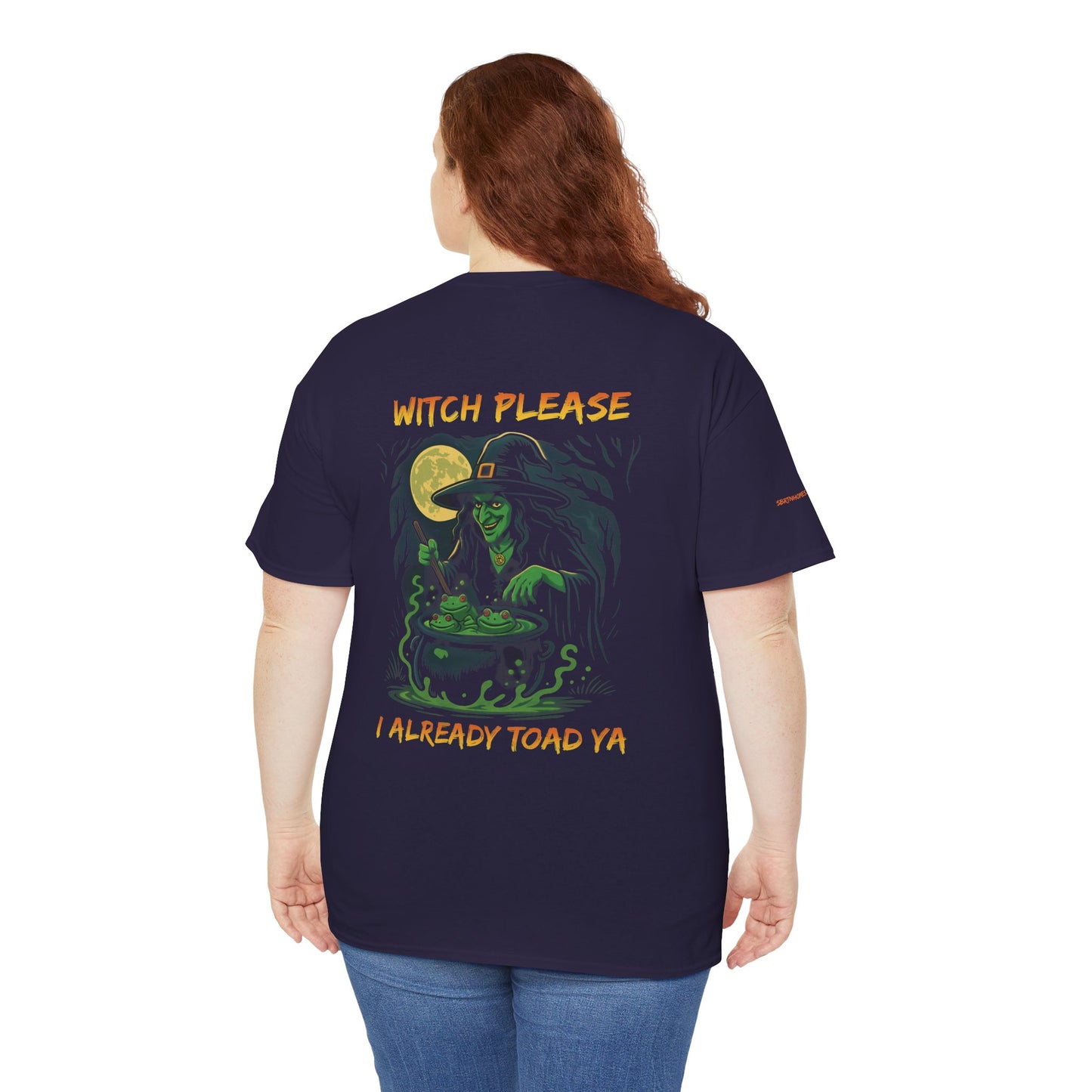 Person wearing a navy blue t-shirt with a witch graphic and text on the back, on a white background.