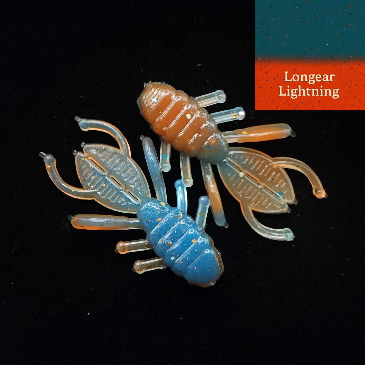 Colorful crawfish-shaped fishing lure with 'Longear Lightning' label on a black background