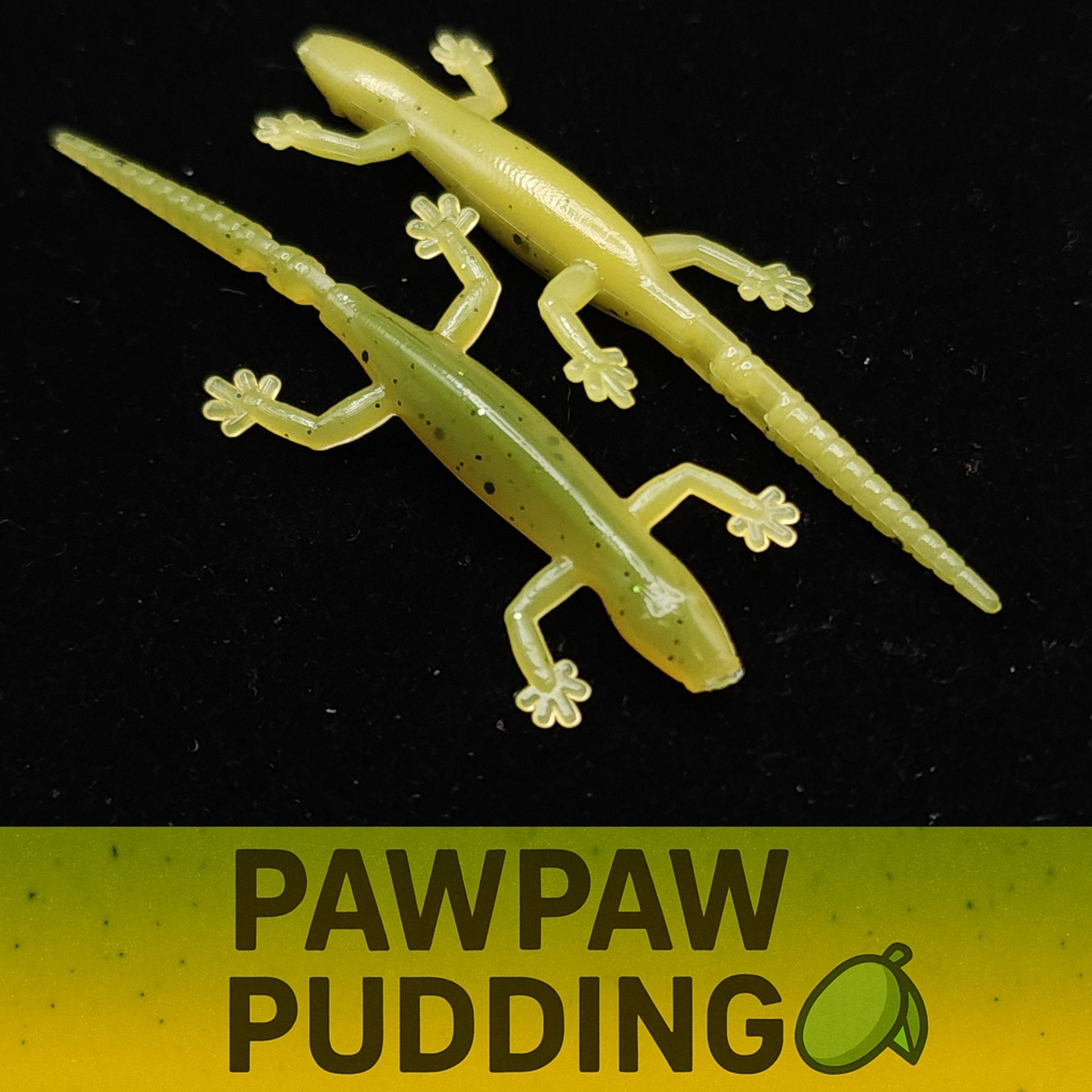 Two green lizard-shaped items on a black background with 'Pawpaw Pudding' text below.