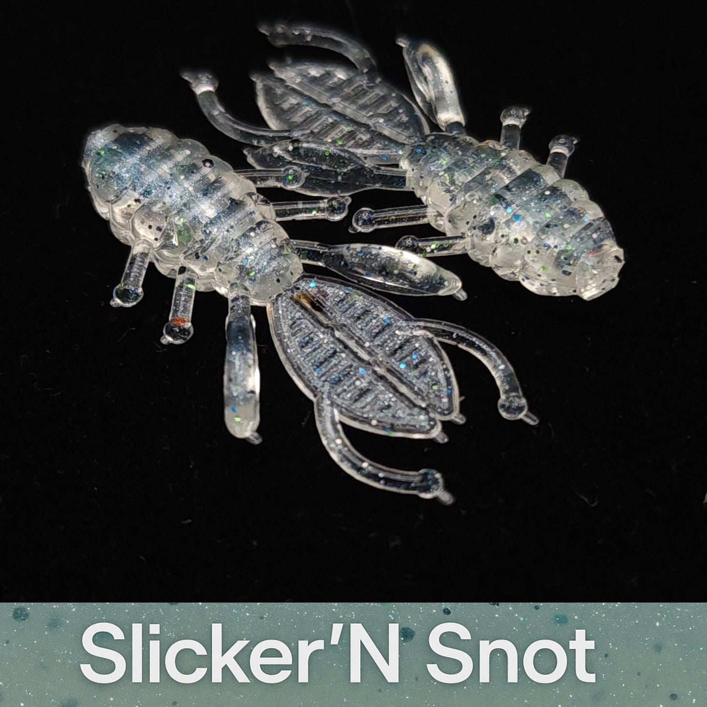 Transparent insect-shaped lures on a black background with 'Slicker'N Snot' branding.