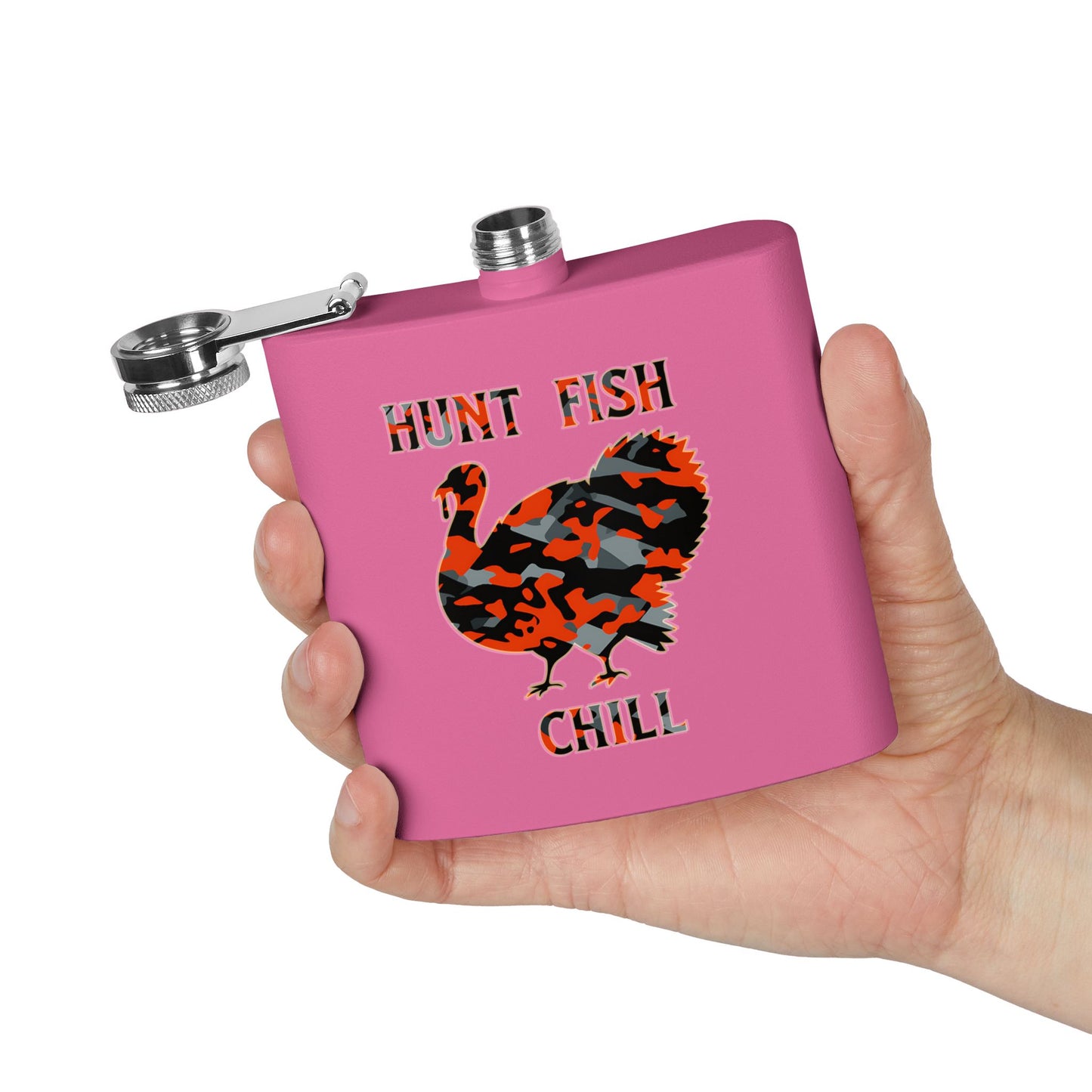 Pink flask with a turkey graphic and 'Hunt Fish Chill' text held in a hand against a white background