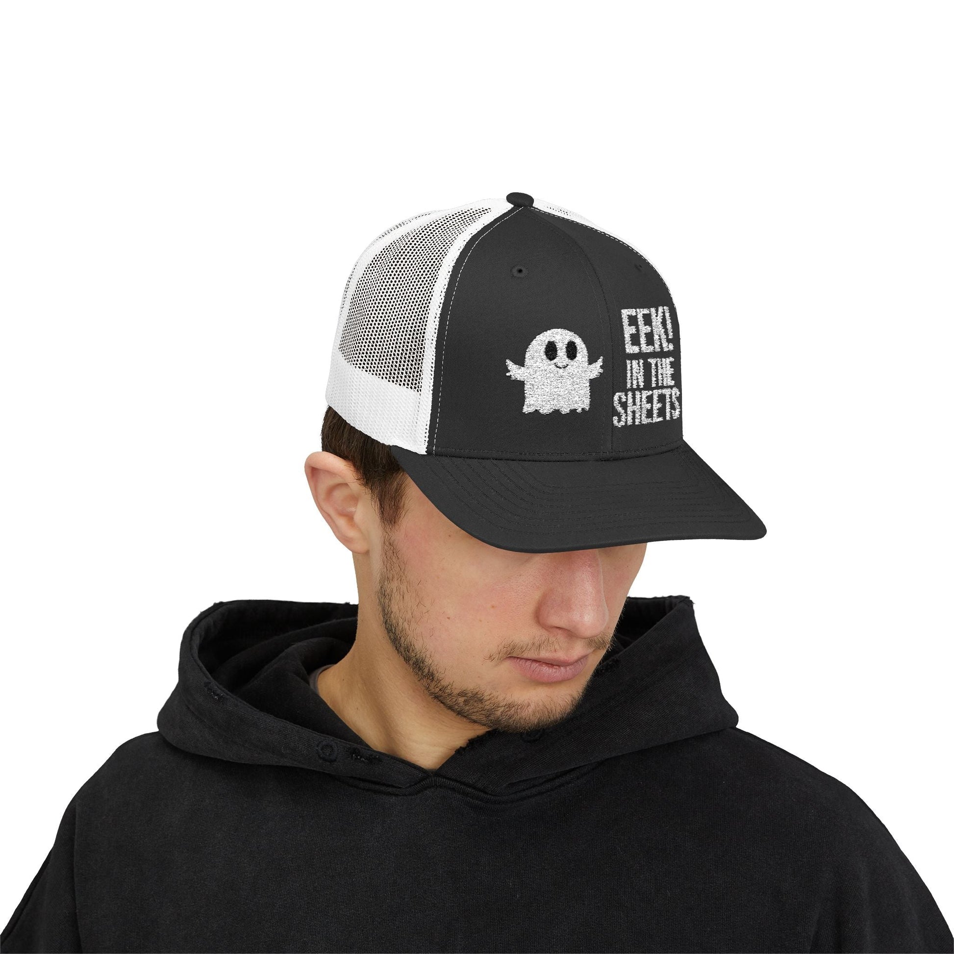 Eek in the Sheets Ghost Hat – Cute Halloween Pun Snapback Trucker Cap – Black / White Hats by Printify